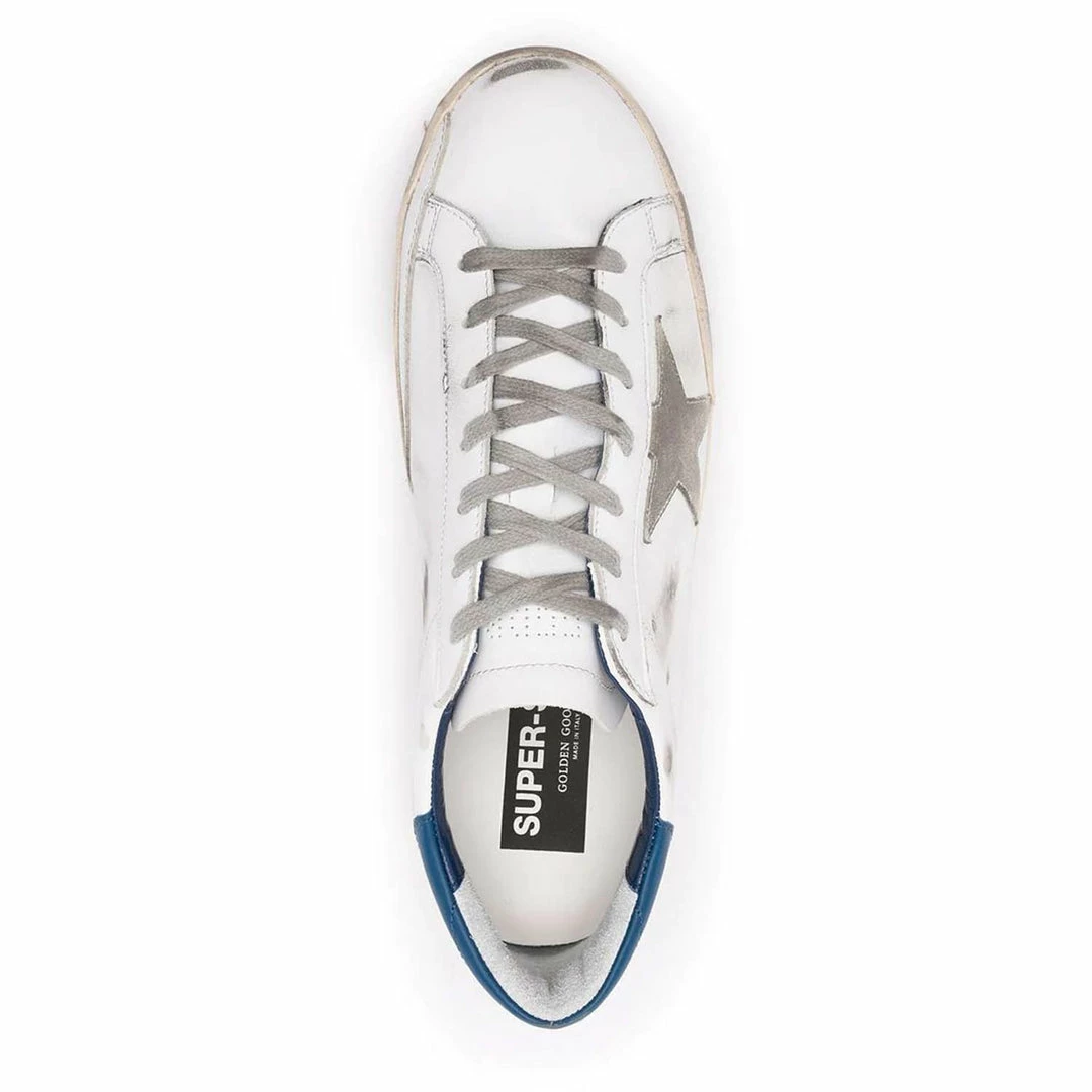 Golden Goose Deluxe Brand GOLDEN GOOSE MAN WHITE SUPER-STAR SNEAKERS WITH BLUE SPOILER AND SUEDE STAR