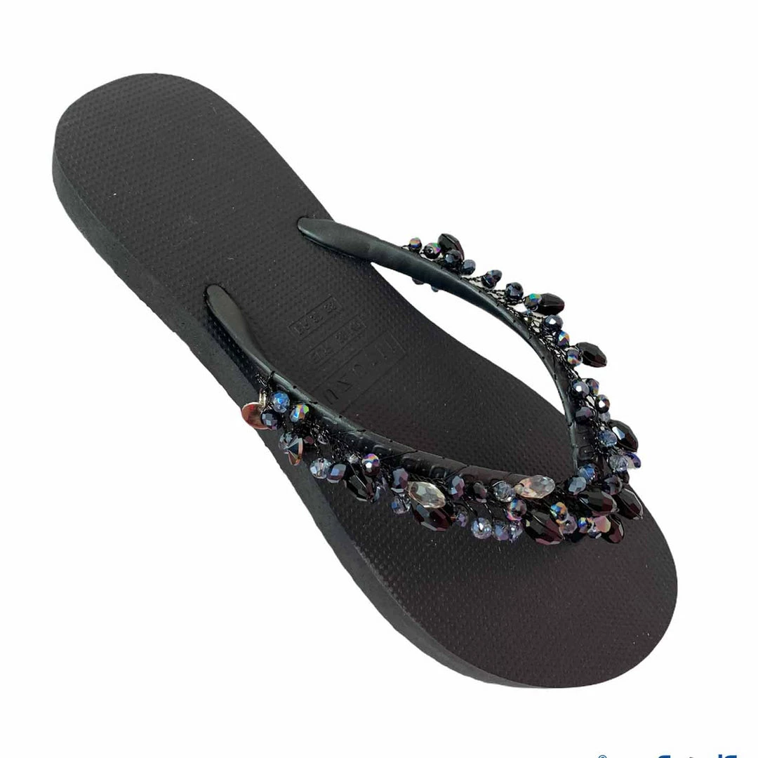 UZURII EMBELLISHED BLACK AMAZON FLIP FLOPS