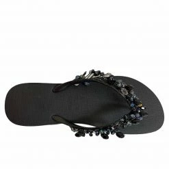 UZURII EMBELLISHED BLACK AMAZON FLIP FLOPS